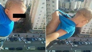Zavesil batoľa z 15. poschodia, zbieral lajky