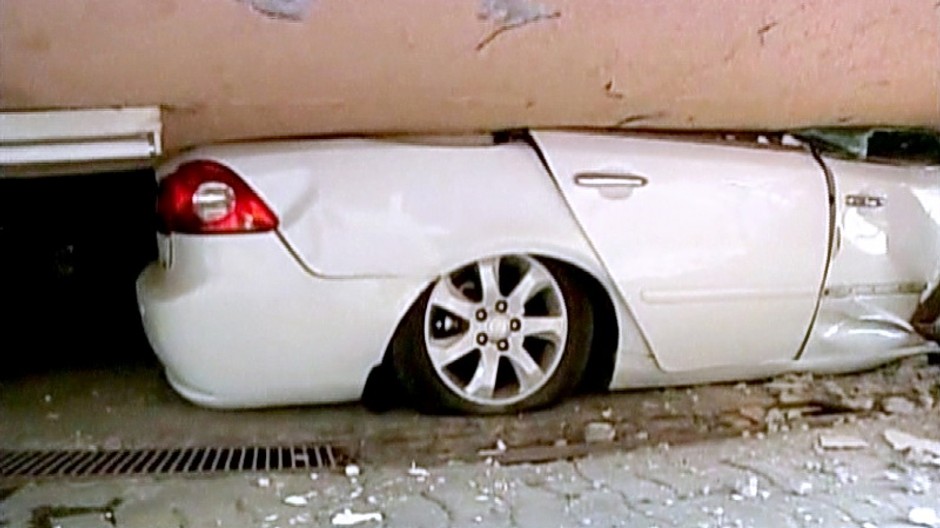 Zničené auto po zemetrasení v Čile