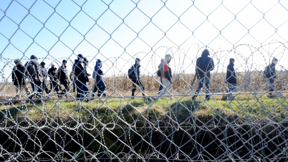 Migranti, utečenci, plot